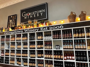 A wine display at Georgetown Winery with a sign indicating it was established in 2006.