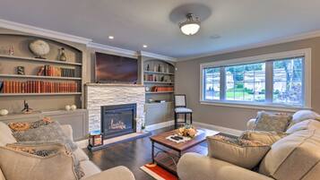 TV, fireplace, books