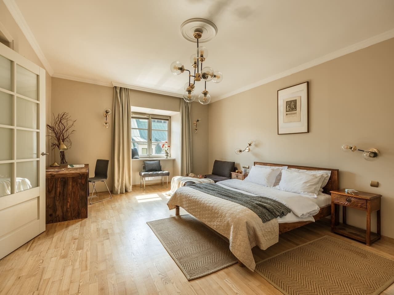 Desk, iron/ironing board, bed sheets
