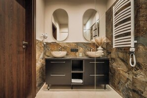 A bathroom with a double sink, two mirrors, a towel rack, and a telephone. - White Lotus - 2-bed apartment, full kitchen (Kraków)