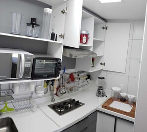 Private kitchen - Cozy apartment in a condominium with complete leisure facilities. (Ipojuca)