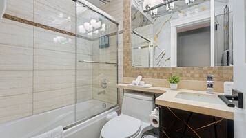 Hair dryer, bidet, towels, soap