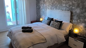 2 dormitorios, tabla de planchar con plancha, wifi gratis y ropa de cama