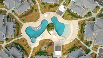 Deluxe Villa, Partial Ocean View | Pool | 2 outdoor pools