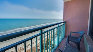 A balcony with a view of the beach and ocean. - New Direct Ocean View 12th Floor, Sandcastle South (Myrtle Beach)
