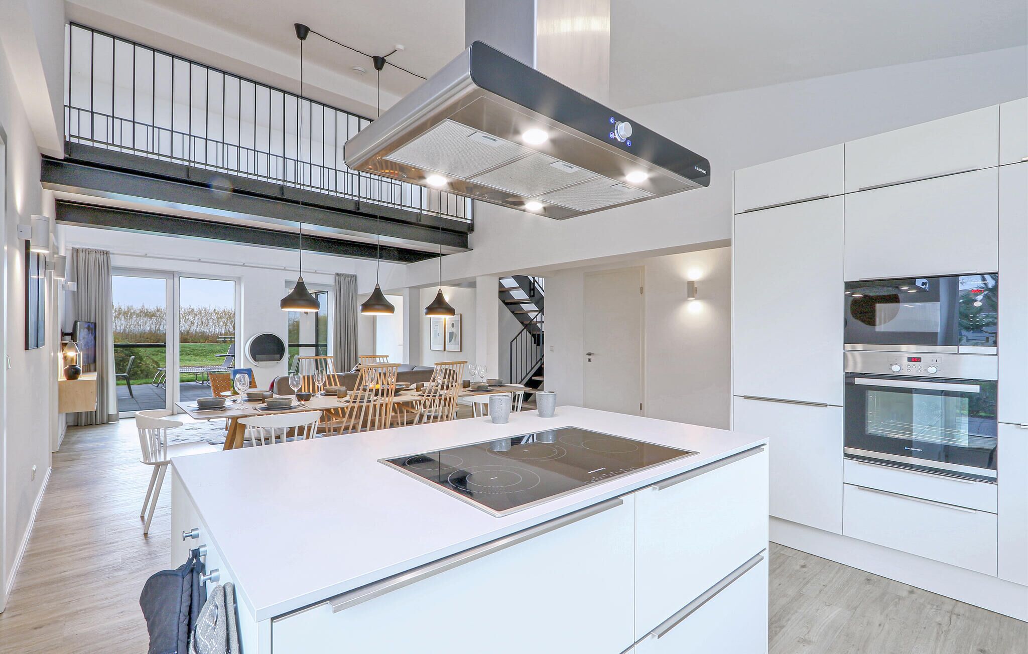 Fridge, stovetop, dishwasher, coffee/tea maker