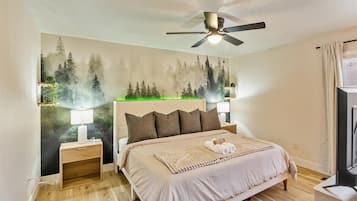 3 dormitorios, tabla de planchar con plancha, cuna de viaje