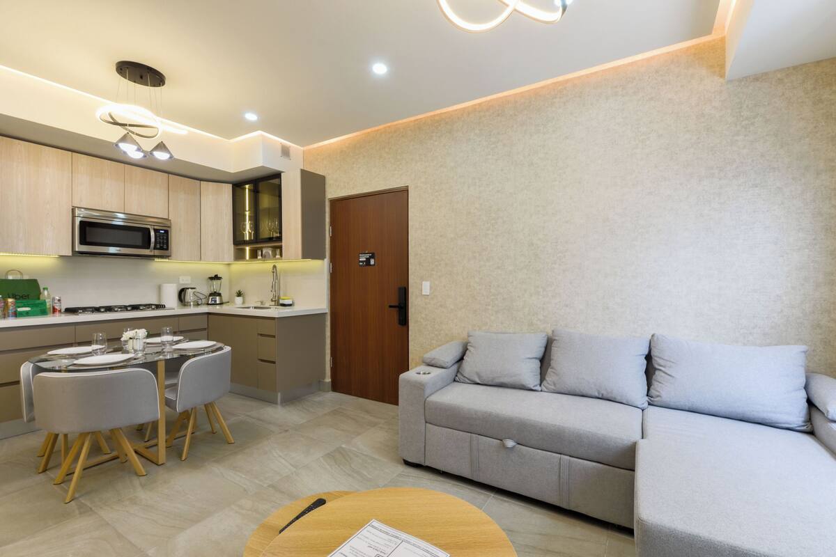Gallery Suite, City View | Living area | 55-inch Smart TV with digital channels, streaming services