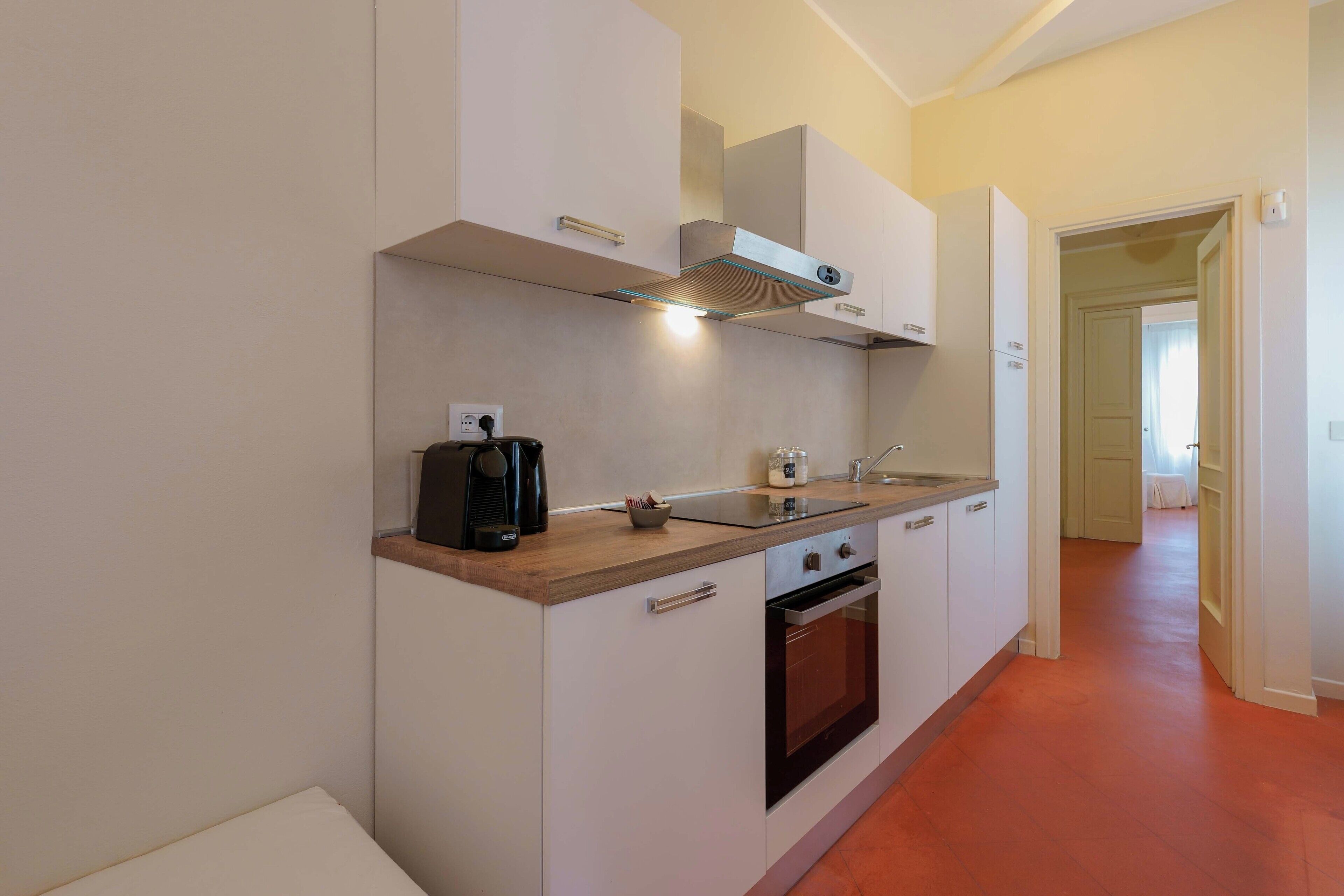 Appartement (Family Retreat - Primo Piano) | Privékeuken | Een koelkast/vriezer, een oven, een kookplaat, een espressoapparaat