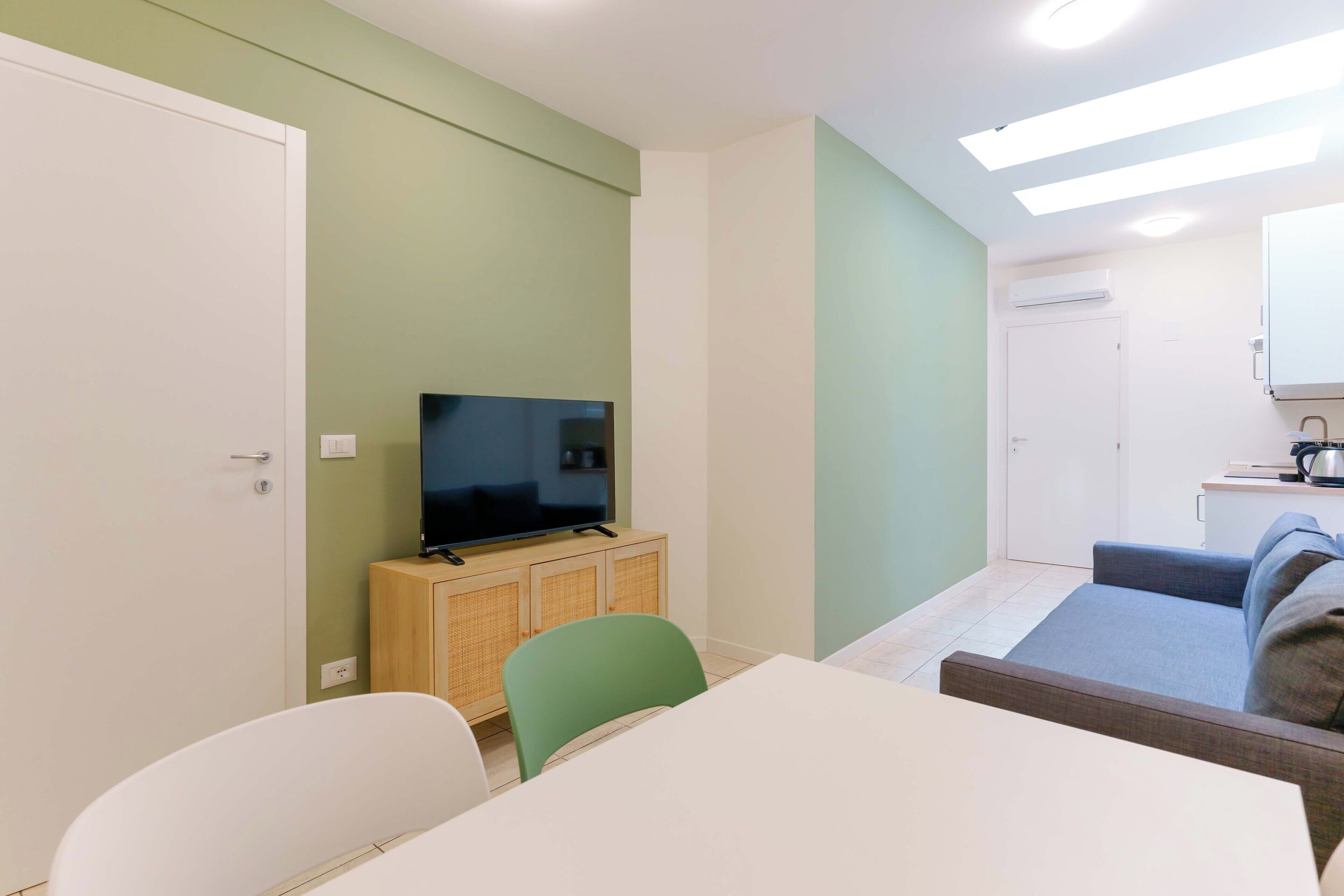 Dimore d'Azeglio 1 | Living area | 45-inch flat-screen TV with digital channels