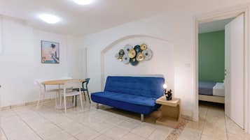 Dimore d'Azeglio 2 | Living area | 45-inch flat-screen TV with digital channels
