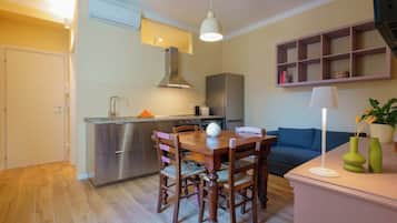 Apartment (Spacious Family) | Private kitchen | Full-size fridge, microwave, stovetop, cookware/dishes/utensils