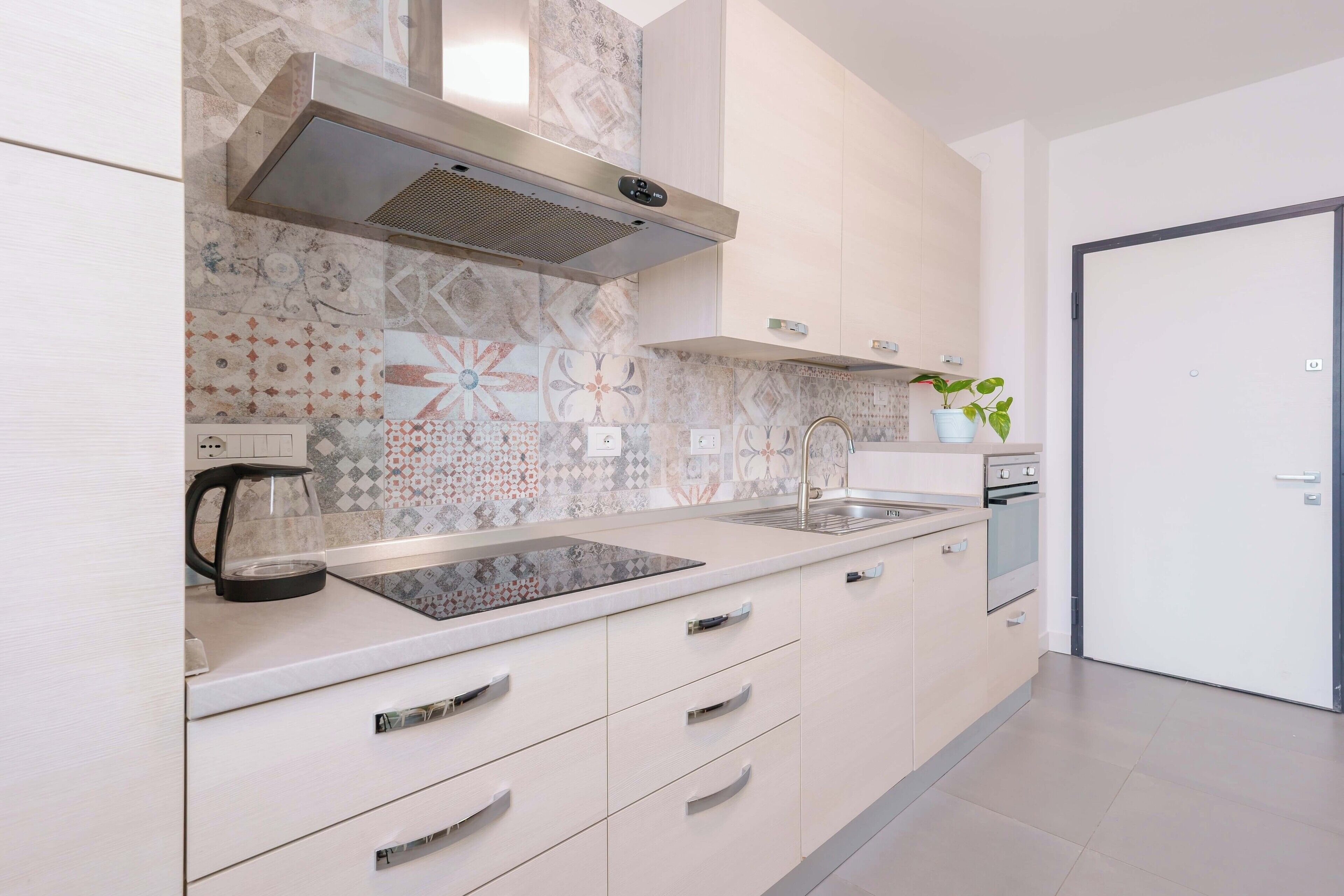 Apartment (West Side) | Private kitchen | Full-sized fridge, oven, stovetop, espresso maker