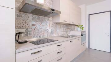 Apartment (West Side) | Private kitchen | Full-sized fridge, oven, stovetop, espresso maker