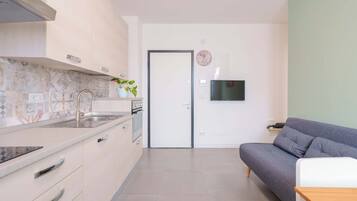 Apartment (West Side) | Private kitchen | Full-sized fridge, oven, stovetop, espresso maker