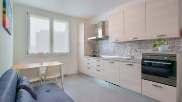 Apartment (West Side) | Living area | 45-inch flat-screen TV with digital channels