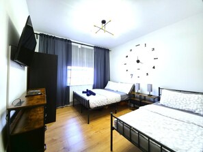2 dormitorios, tabla de planchar con plancha, Internet y ropa de cama