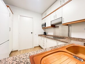 Microwave, dishwasher, coffee/tea maker, toaster
