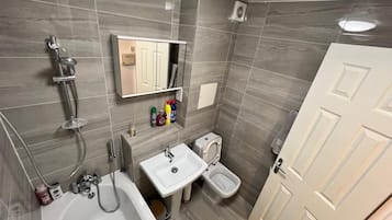 Hair dryer, bidet, towels, soap