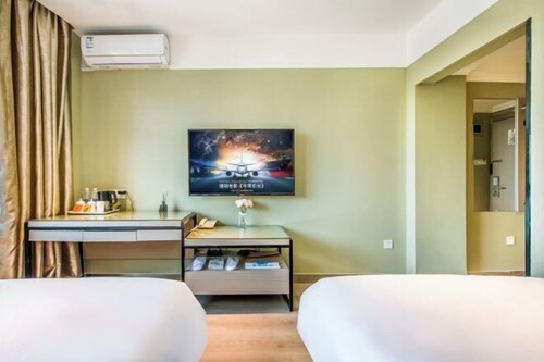 Meiyi Hotel(Urumqi Hongshan Park Xinxing Street Subway Station Store)