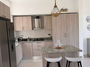 Stovetop - Fantastic 2-bedroom apartment with AC  Social area in guayacanes (San Pedro de Macorís)