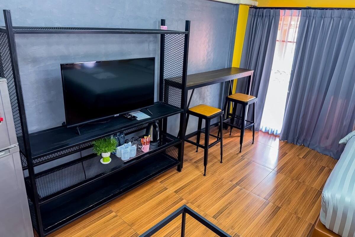 Family Quadruple Room, Balcony, Hill View | Desk, laptop workspace, blackout drapes, soundproofing