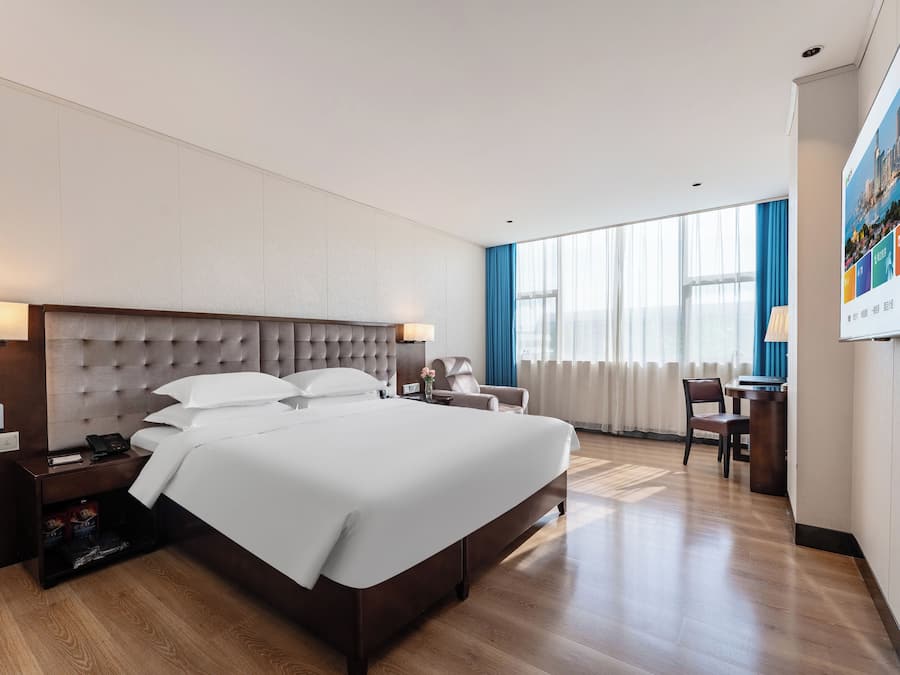 Desk, laptop workspace, blackout drapes, soundproofing