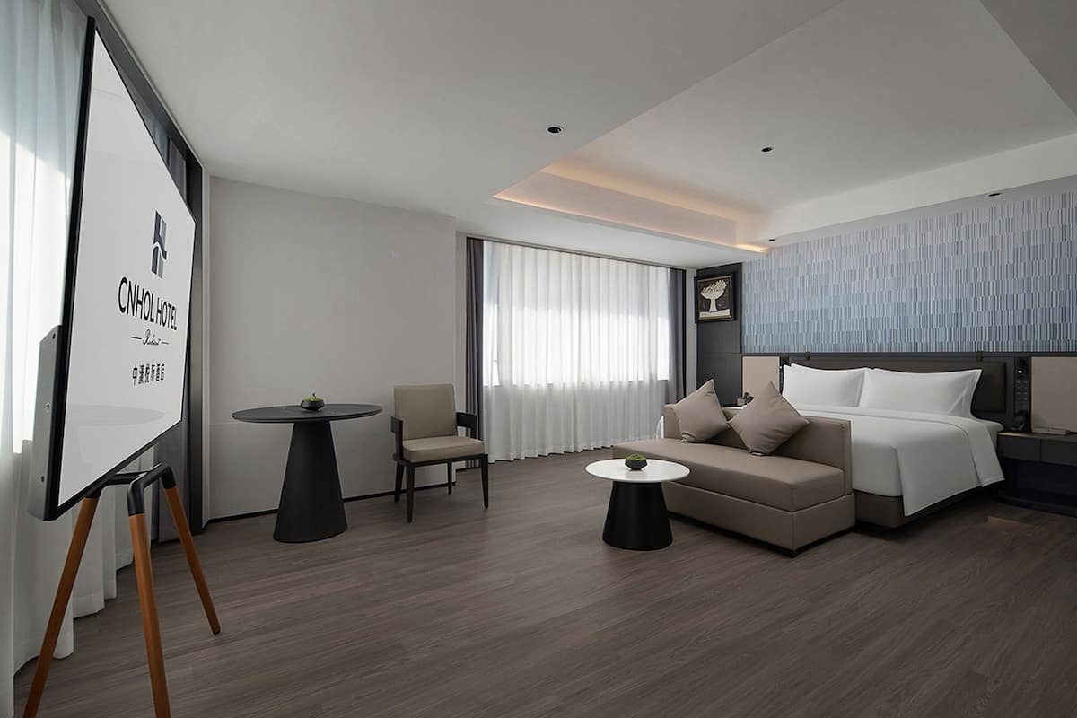 Family Suite, City View | Desk, laptop workspace, blackout drapes, soundproofing