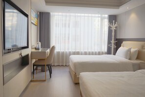 A hotel room with two beds, a desk, a chair, a TV, and a large window with curtains. - Golden Valley One Hotel Sports Center  (Shenzhen)
