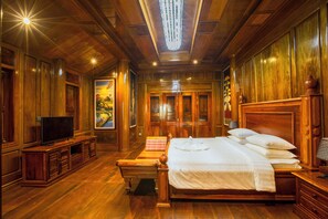 Traditional Tree House, Balcony, Garden View | Minibar, in-room safe, individually decorated, individually furnished - Phum Mongkol Village (Battambang)