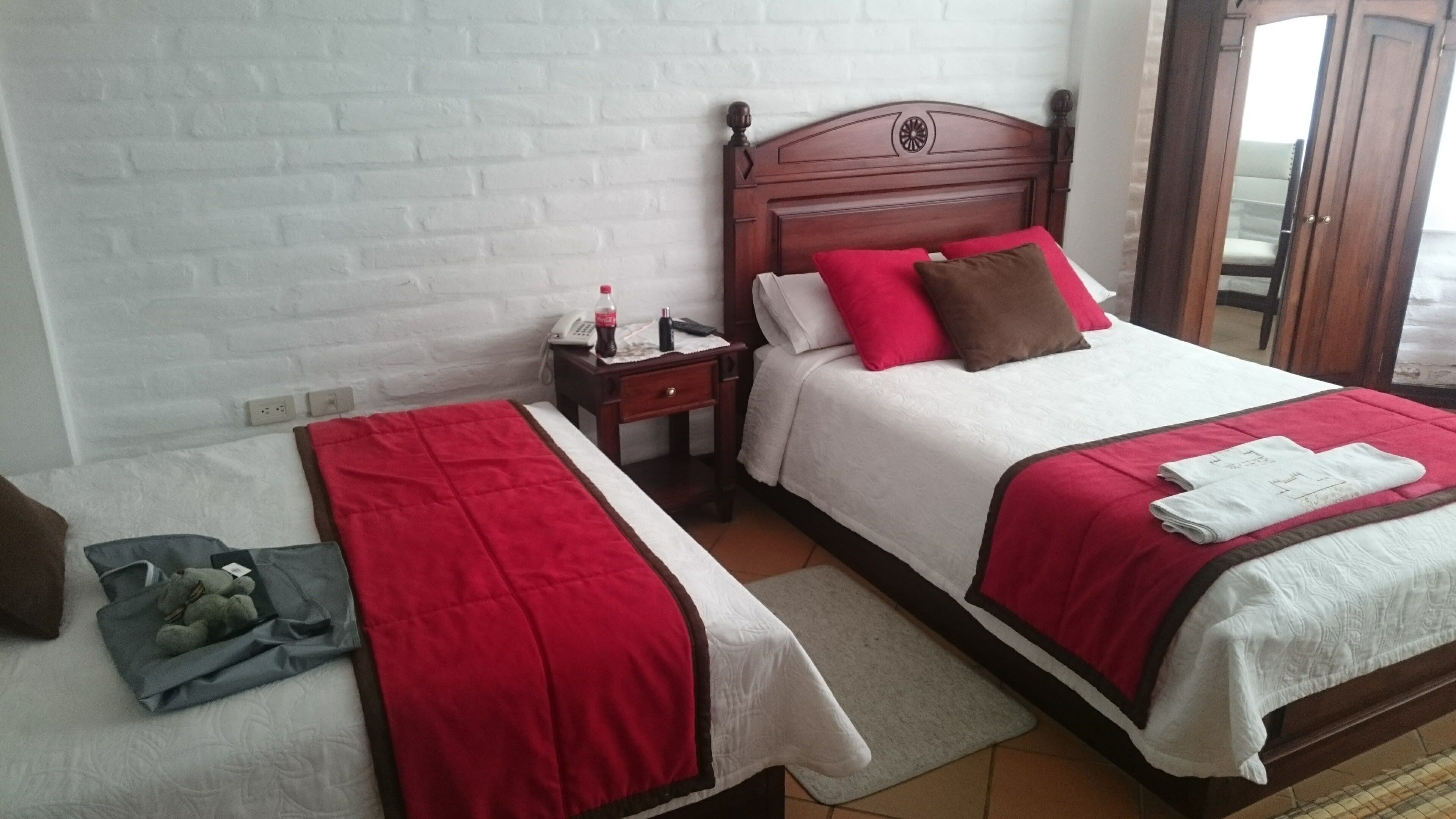 Quarto duplo conforto, vista para o jardim