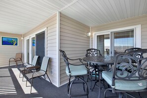 Outdoor dining - Oceanside Retreat Steps from the Beach | Heated Pool Access (Tybee Island)