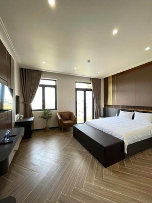 Habitación doble Deluxe, balcón | Wifi gratis y ropa de cama 