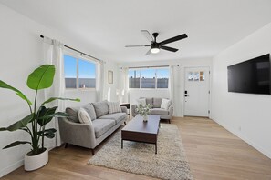 Living area - Cozy 2BR Retreat with Backyard Lounge (Aurora)