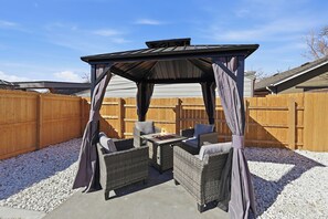 Outdoor dining - Cozy 2BR Retreat with Backyard Lounge (Aurora)