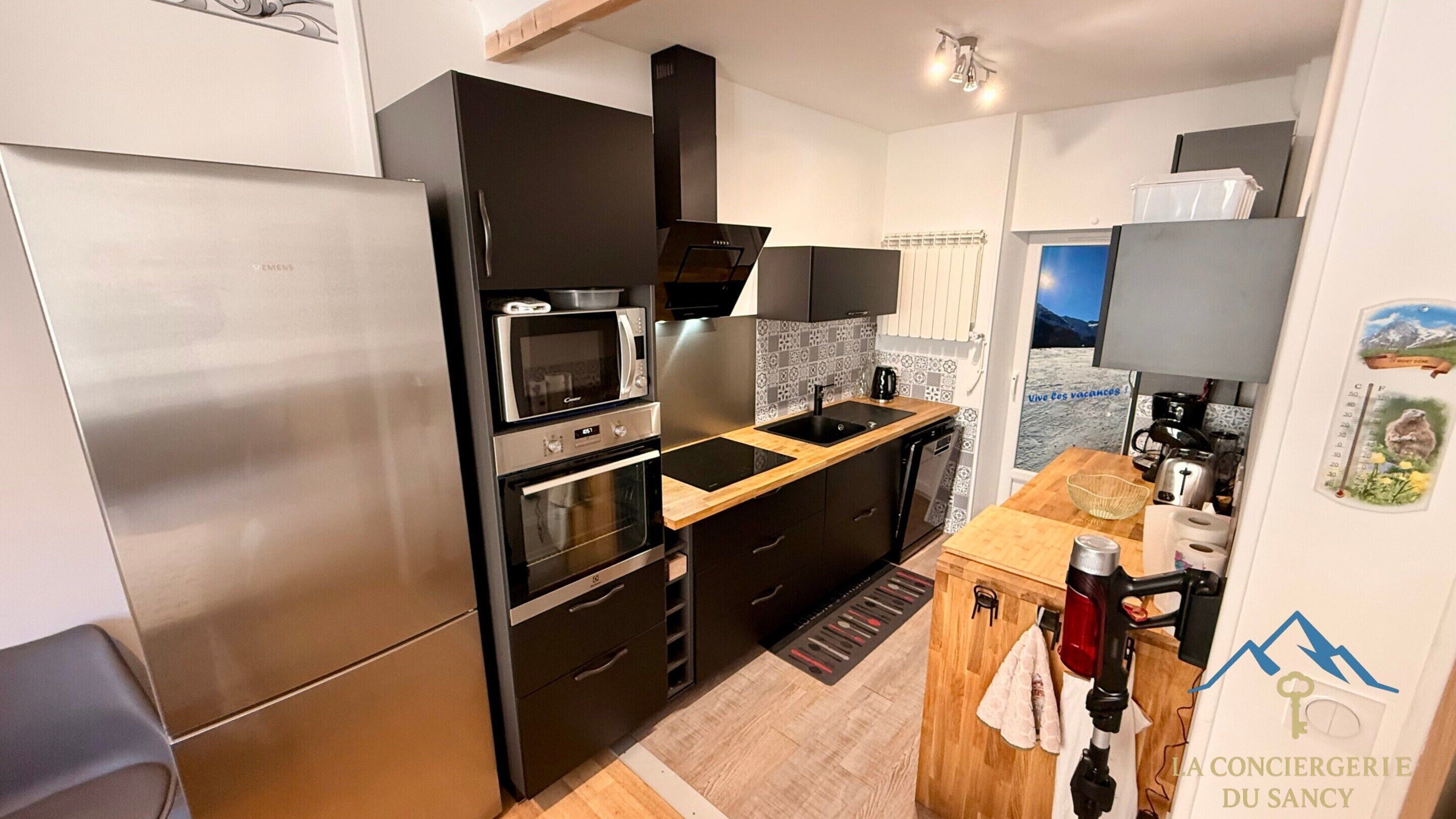 Appartement | Cuisine privée | Chaise haute