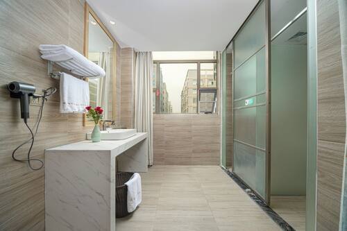 Superior Twin Room, City View | Bathroom | Shower, free toiletries, hair dryer, slippers