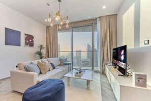 TV - High Floor 1BR Burj View Apartment by fam Living (Dubai)