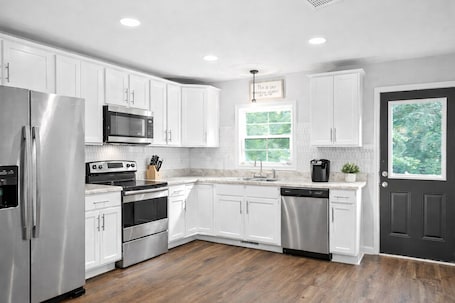 Private kitchen. Downtown Retreat 2 BR 2.5 Bath 5 Beds