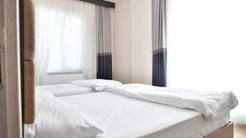 In-room safe, desk, laptop workspace