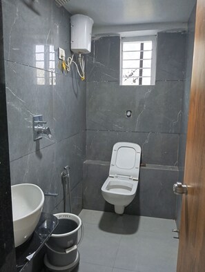 Deluxe Double Room, City View | Bathroom | Free toiletries, slippers, towels, soap - HOTEL GERMAN (Gandhinagar)