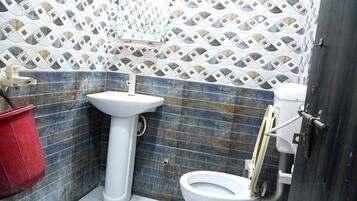 Shower, free toiletries, towels, soap