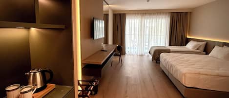 Deluxe Triple Room, Non Smoking | Laptop workspace, free WiFi