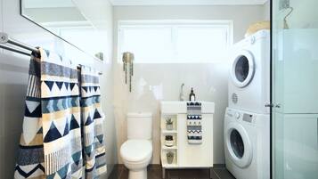 Shower, hair dryer, towels