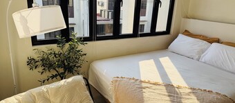 Cozy 2-bedroom house in tranquil Dasmariñas with AC
