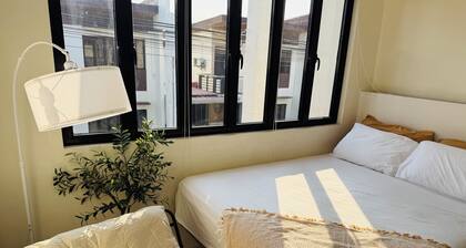 Cozy 2-bedroom house in tranquil Dasmariñas with AC