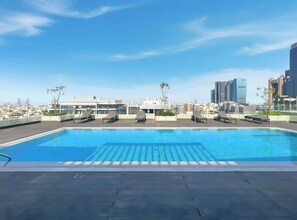 Outdoor pool - 1BR Stay Near World Trade Center Metro (Dubai)