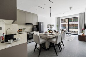 Deluxe Apartment, Balcony | Private kitchen - 1BR Stay Near World Trade Center Metro (Dubai)