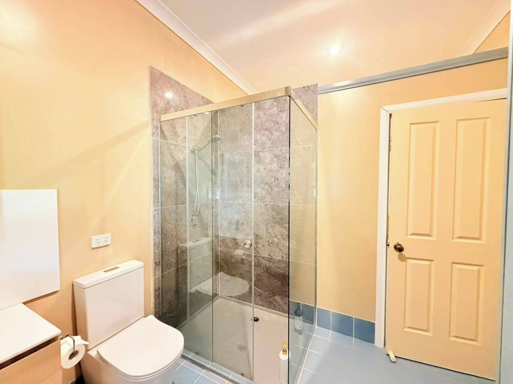 Shower, hair dryer, towels, shampoo