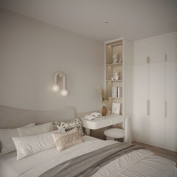 A bedroom with a bed, a desk, and a wardrobe. - The Aura Patong (Patong)